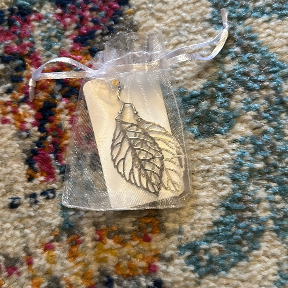 Silver toned leaf earrings with slide in loop backs
